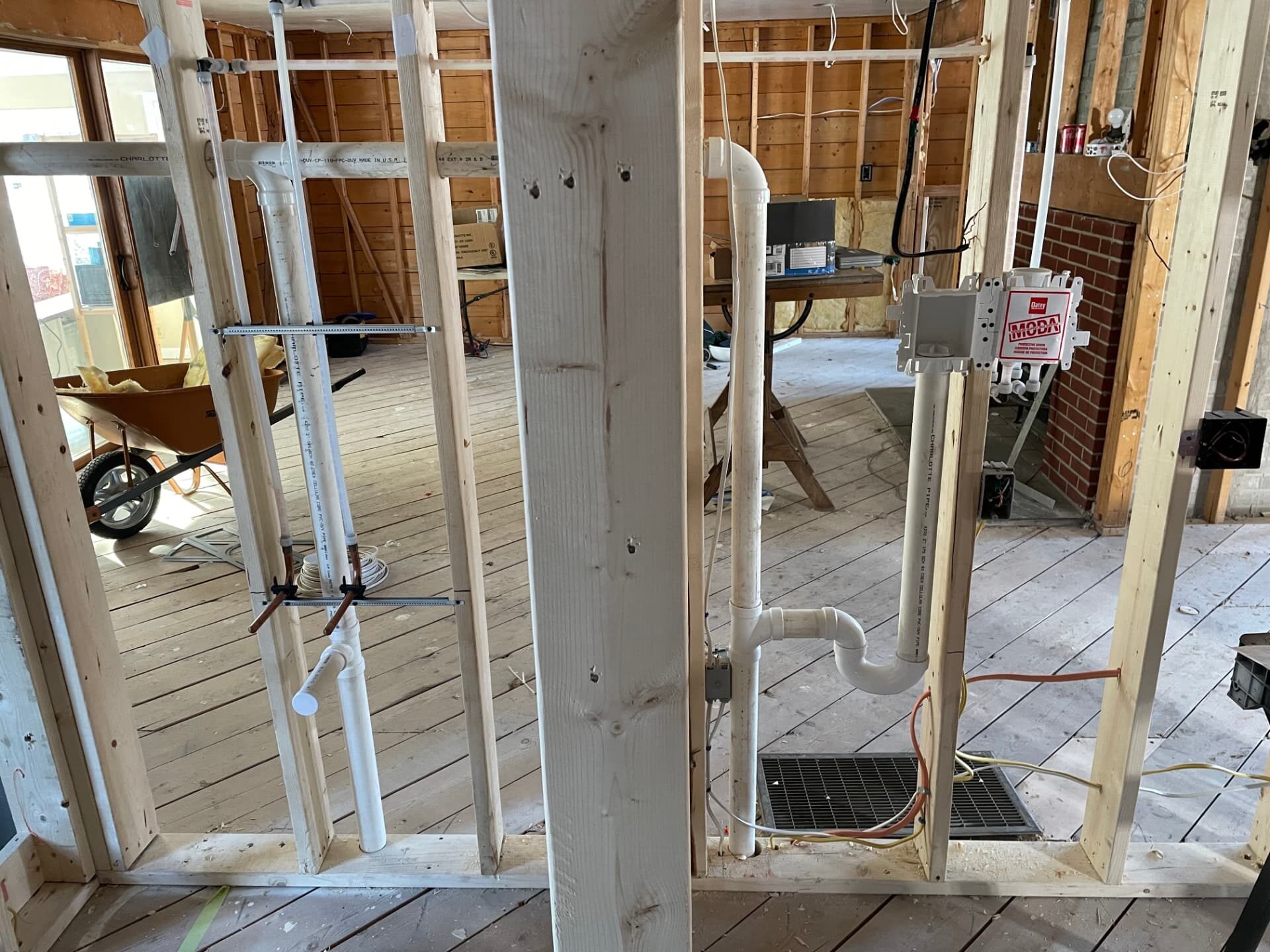 Plumbing installation for a new bathroom sink and laundry room in Andover, MA by Top Shelf Plumbing & Heating